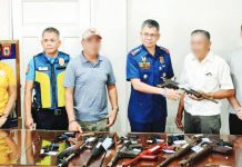 Barangay officials turn over a total of seized 399 short firearms and 151 long firearms to the Capiz Police Provincial Office, led by Provincial Director Colonel David Cachumbo. CPPO PHOTO
