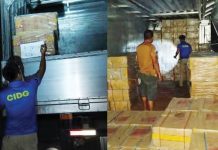Operatives of the CIDG-Negros Occidental Provincial Field Unit inspect master cases of illicit cigarettes and cargo inside a wing van truck following a buy-bust operation in Barangay 3, Isabela, Negros Occidental, early Friday morning, September 25. The operation led to the arrest of three suspects. CIDG PHOTOS