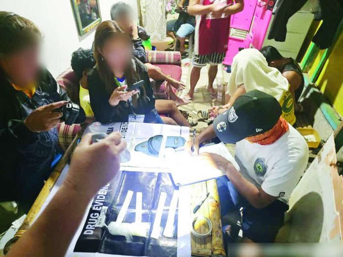 Operatives of the Estancia Municipal Police Station inventory approximately 230 grams of suspected shabu valued at around P1.6 million seized in a buy-bust operation in Purok Paghidaet, Barangay Poblacion Zone 2, Estancia, Iloilo on Sept. 1, 2026. Four suspects were arrested while three others were able to escape. IPPO PHOTO