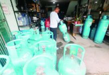 BIR implements LPG, kerosene excise tax suspension anew A worker prepares a liquefied petroleum gas tank for delivery at a store in Paco, Manila, on Sept. 24, 2026. President Ferdinand R. Marcos Jr. earlier approved the renewed suspension of excise tax on kerosene and liquefied petroleum gas to ease the impact of rising oil prices. PNA PHOTO BY YANCY LIM