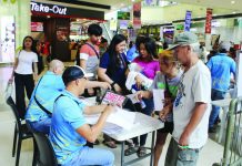 Residents line up during the final day of voter registration conducted by Commission on Elections (Comelec) - Iloilo City at Robinsons Place Iloilo Main on May 18, 2026. With President Ferdinand Marcos Jr. signing Republic Act No. 12326, the November 2026 Barangay and Sangguniang Kabataan Elections has been officially reset to November 2028, extending the term of incumbent barangay and SK officials to five years. Comelec operations for the 2026 polls have been ordered suspended. PN FILE PHOTO
