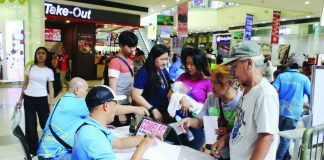 Residents line up during the final day of voter registration conducted by Commission on Elections (Comelec) - Iloilo City at Robinsons Place Iloilo Main on May 18, 2026. With President Ferdinand Marcos Jr. signing Republic Act No. 12326, the November 2026 Barangay and Sangguniang Kabataan Elections has been officially reset to November 2028, extending the term of incumbent barangay and SK officials to five years. Comelec operations for the 2026 polls have been ordered suspended. PN FILE PHOTO