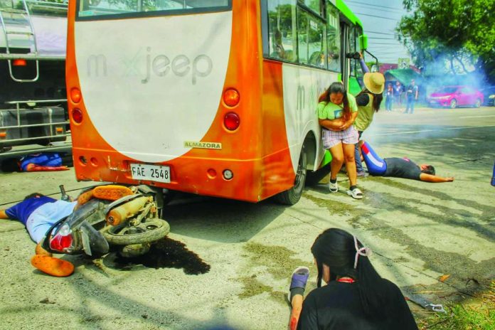 front_pic_1_compressed_resized Emergency responders perform hazmat containment, vehicular extrication, and patient triage during PROJECT MedX: Western Visayas Emergency Medical Simulation Exercises in Barangay Pakiad, Oton, Iloilo on Wednesday, Sept. 9, 2026. The full-scale drill — simulating a multi-vehicle crash involving a chemical tanker — tested over 30 public and private institutions under high-pressure conditions to identify response gaps and improve coordination. ALLEN ANIMAS/PN