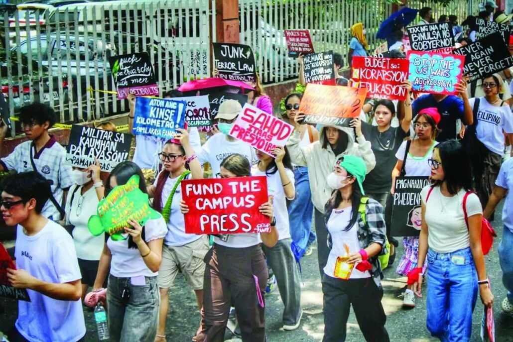 Youth leaders, human rights advocates, and progressive groups march through the streets of Iloilo City on Monday, Sept. 21, 2026, marking the 54th anniversary of the declaration of Martial Law with calls to end political dynasties, systemic corruption, and government abuses. Demonstrators urged the public to demand broader political reforms and greater accountability, echoing calls for Congress to pass an anti-political dynasty law. ALLEN ANIMAS/PN