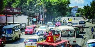 Commuters and public utility vehicles navigate a busy street in La Paz, Iloilo City on Monday morning, Sept. 28, as the newly approved public transport fare increases officially took effect. Low-income workers and parents feared rising transportation costs will consume funds needed for essential household expenses, including food and schooling. ALLEN ANIMAS/PN
