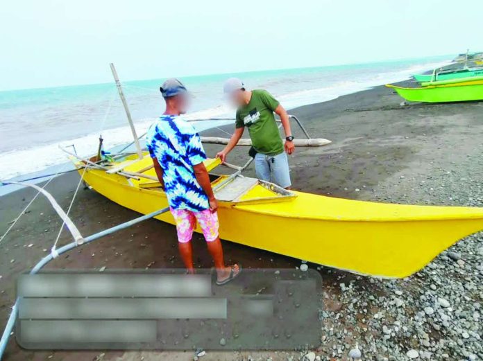 illegal_fishing_compressed_resized Authorities check a motorboat confiscated during an anti-illegal fishing operation in Antique. From Sept. 6 to 7, seven suspects were apprehended and P236,750 worth of equipment and fish were recovered in the province. ANTIQUE PPO PHOTO