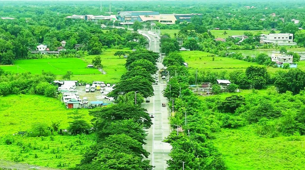 This aerial view along the Iloilo Circumferential Road 1 toward the Hibaoan Flyover in Pavia, Iloilo shows growing commercial and residential communities — areas among those continuously impacted by ongoing rotational brownouts and power supply shortages across Panay Island. ILONGGO TRAVELER PHOTO