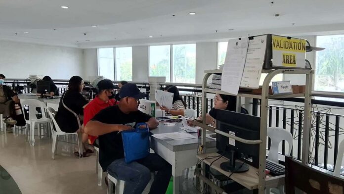ime_freeze_compressed_resized AID ON HOLD. Walk-in clients submit and process their documents for Assistance to Individuals in Crisis Situation (AICS) at the Office of the Provincial Social Welfare and Development in the Iloilo Provincial Capitol. While applications continue to be accepted and processed, the release of financial assistance has been temporarily suspended from Sept. 18 to Nov. 1, 2026, in compliance with the election spending ban ahead of the Nov. 2 Barangay and Sangguniang Kabataan elections.