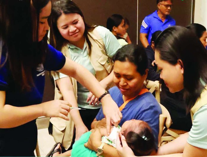 A health worker administers a measles-rubella vaccine to a young child in Roxas City, as part of the 2026 Measles-Rubella Supplemental Immunization Activity. The Department of Health has lauded healthcare workers, local government units, parents and other partners for supporting the region-wide campaign while urging continued efforts to reach children who remain unprotected. DOH-6