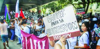 Youth and student groups join a protest in Iloilo City, with one demonstrator carrying a placard reading “Badyet Para sa Edukasyon,” as they call attention to public education funding and government spending priorities. The mobilization comes amid concerns over a reported P33-billion funding gap between the proposed budgets of state universities and colleges in Western Visayas and the allocation under the proposed 2027 national budget. ALLEN ANIMAS/PN