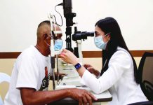 Ophthalmologist Dr. Aliette Alyssa R. Mesa of Western Visayas Medical Center in Mandurriao, Iloilo City examines the eyes of a 69-year-old patient suffering from blurry vision. Early detection of an eye problem can prevent far more severe complications down the line, especially since vision is so fundamental to how people interact with the world. ALLEN ANIMAS/PN