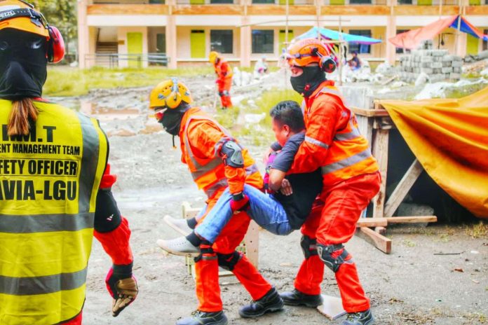neljoy_drill_copy_compressed_resized The Municipality of Pavia, Iloilo conducted a Collapsed Structure Search and Rescue (CSSR) Simulation Exercise on September 10, 2026, as part of the 3rd Quarter Nationwide Simultaneous Earthquake Drill (NSED) at Pavia National High School, Pavia, Iloilo. ALLEN ANIMAS/PN