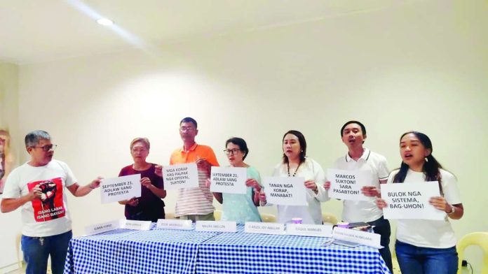 Members of Kahublagan Kontra Korapsyon and Pamatan-on Kontra Korapsyon hold protest placards opposing the proposed postponement of the November 2 Barangay and Sangguniang Kabataan Elections. The watchdogs warned that extending incumbent village officials’ terms to 2028 denies voters their rights and risks building political machinery for the next presidential election. NELJOY N. GALIGAO/PN