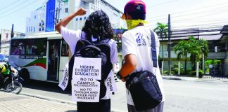 Youth activists take their campaign to the streets of Iloilo City, carrying placards calling for a higher education budget, an end t campus militarization, and no increase in tuition and other school fees. FORUM DIMENSIONS - WVSU