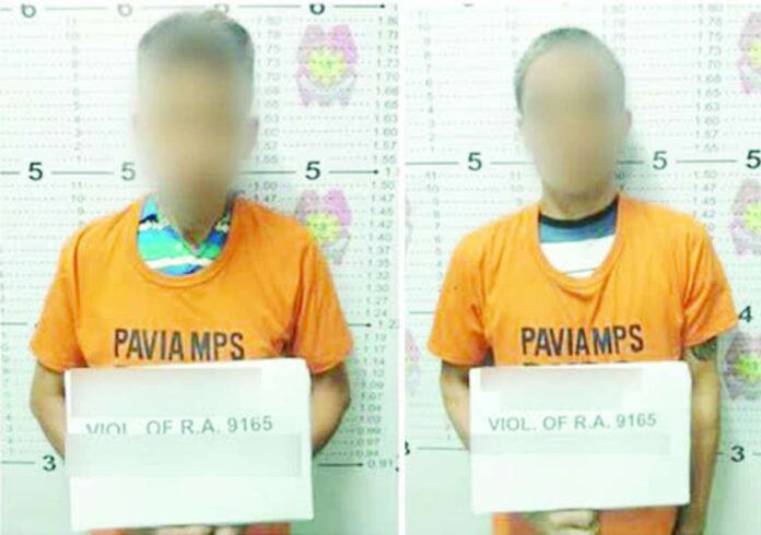pavia_drug_sting.JPG_resized Police apprehend aliases “Arnold” and “Joeann” after they sold a plastic sachet of suspected shabu to a poseur buyer in a buy-bust operation in Barangay Purok 4, Pavia, Iloilo, on Sept. 18, 2026. PRO-6 Photos