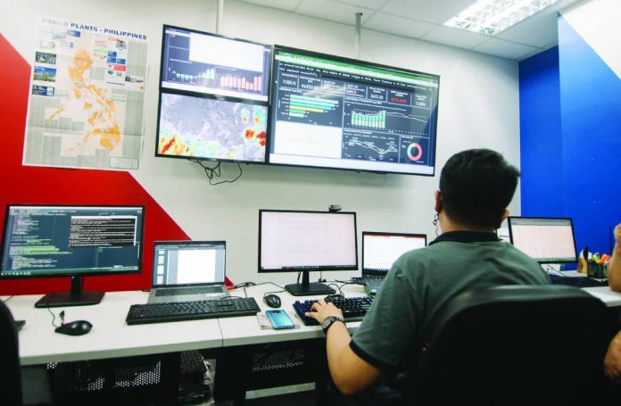 secondary more power_compressed A MORE Electric and Power Corporation (MORE Power) employee monitors power generation and grid conditions at MORE Power’s control room in Iloilo City. The distribution utility says insufficient available supply is affecting all distribution utilities connected to the grid, including its operations in the city.