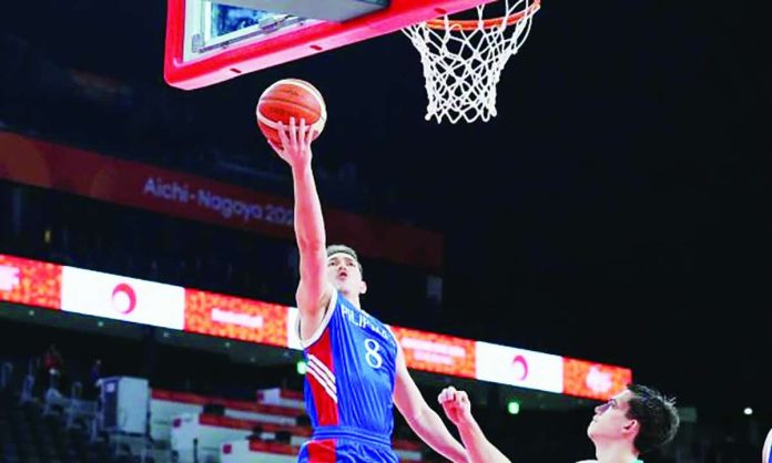 sports_China_compressed_resized Gilas Pilipinas’ Robert Bolick attacks the basket for a layup during the 2026 Asian Games men’s basketball tournament. SBP