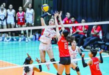 San Beda University Lady Red Spikers rookie Khim Culanay scores against the defense of University of the East Lady Warriors. V-LEAGUE