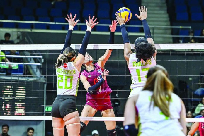 sports_EST_compressed_resized Thailand’s EST Cola’s Papatchaya Phontham attacks against the defense of Nxled Chameleons’ MarJana Phillips during the 2026 PVL Invitational. EST Cola swept Nxled, 25-22, 25-21, 25-19, to capture the championship. PVL