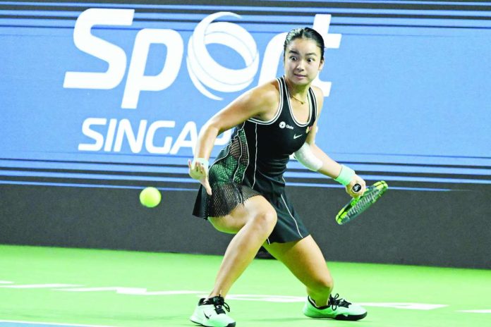 sports_Eala_copy_compressed_resized Alexandra Eala struggles with her serve throughout a three-set battle upset in the Round of 16 of the Singapore Tennis Open on Thursday at the OCBC Arena in Singapore.