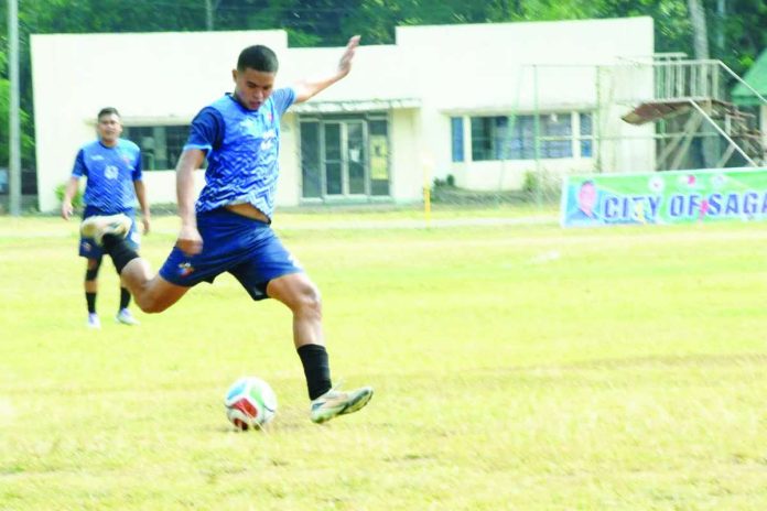 sports_Erwin_compressed_resized A player kicks the ball during the opening ceremonies of the CASAMA Cup at the Sagay National High School football field in Sagay City on Monday, August 31. SAGAY CITY PIO
