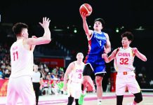 Gilas Pilipinas guard Adrian Nocum drives for a basket against the China defense during their Asian Games encounter. ASIAN GAMES