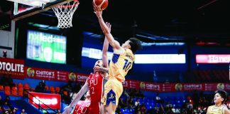 Jose Rizal University Heavy Bombers’ Lawrence Mangubat attacks the defense for a layup. NCAA