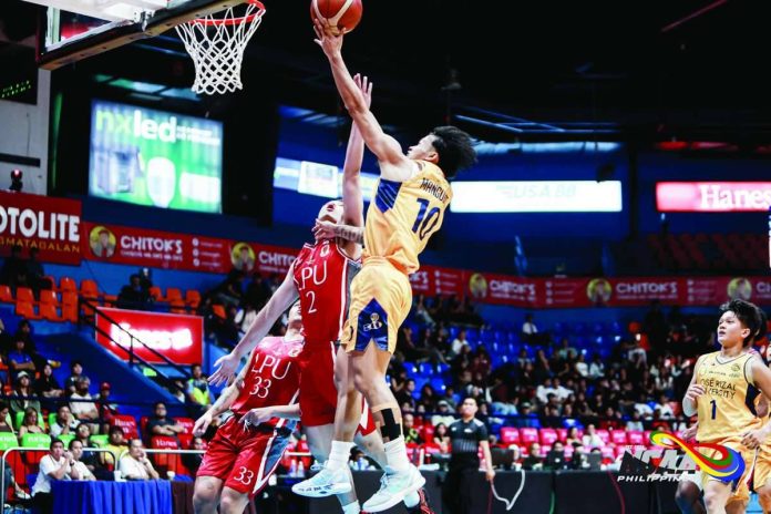 sports_JRU_compressed_resized Jose Rizal University Heavy Bombers’ Lawrence Mangubat attacks the defense for a layup. NCAA