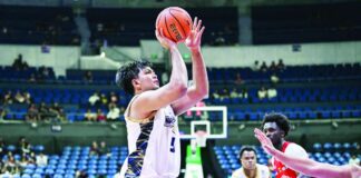 National University Bulldogs’ PJ Palacielo scores easily inside the paint during their 76-56 rout of the University of the East Red Warriors in the UAAP Season 89 men’s basketball tournament. UAAP