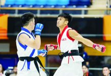 Jean Claude Saclag settles for a silver medal in the men’s traditional -65-kilogram division of the 20th Asian Games in Nagoya, Japan. The medal was the Philippines’ first silver of the Games. POC MEDIA POOL