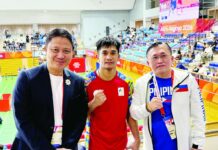 Mixed martial arts fighter Jean Claude Saclag poses with Philippine Sports Commission chairman Patrick Gregorio and Sen. Christopher “Bong” Go after advancing to the men’s traditional -65kg final of the 2026 Asian Games in Nagoya, Japan. Saclag is one victory away from delivering the Philippines its first gold medal of the Games. POC