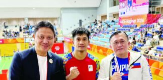 Mixed martial arts fighter Jean Claude Saclag poses with Philippine Sports Commission chairman Patrick Gregorio and Sen. Christopher “Bong” Go after advancing to the men’s traditional -65kg final of the 2026 Asian Games in Nagoya, Japan. Saclag is one victory away from delivering the Philippines its first gold medal of the Games. POC