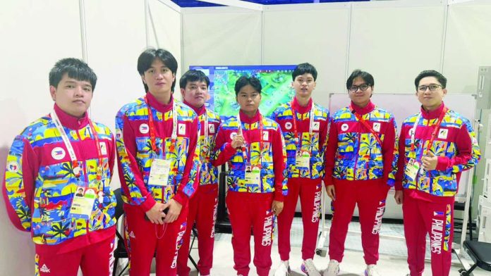 sports_Sibol_compressed_resized Sibol Pilipinas’ Honor of Kings squad celebrates its bronze-medal finish in the 2026 Asian Games in Japan. POC MEDIA POOL