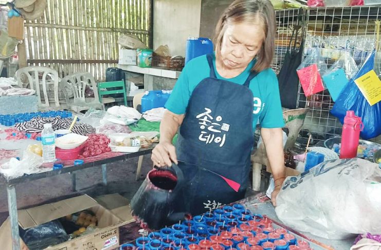 Angela Marbebe of Jordan, Guimaras has spent 26 years making candles. “It really helped us because I became a solo parent to our six children. My husband died when my youngest was only six years old,” she says.
