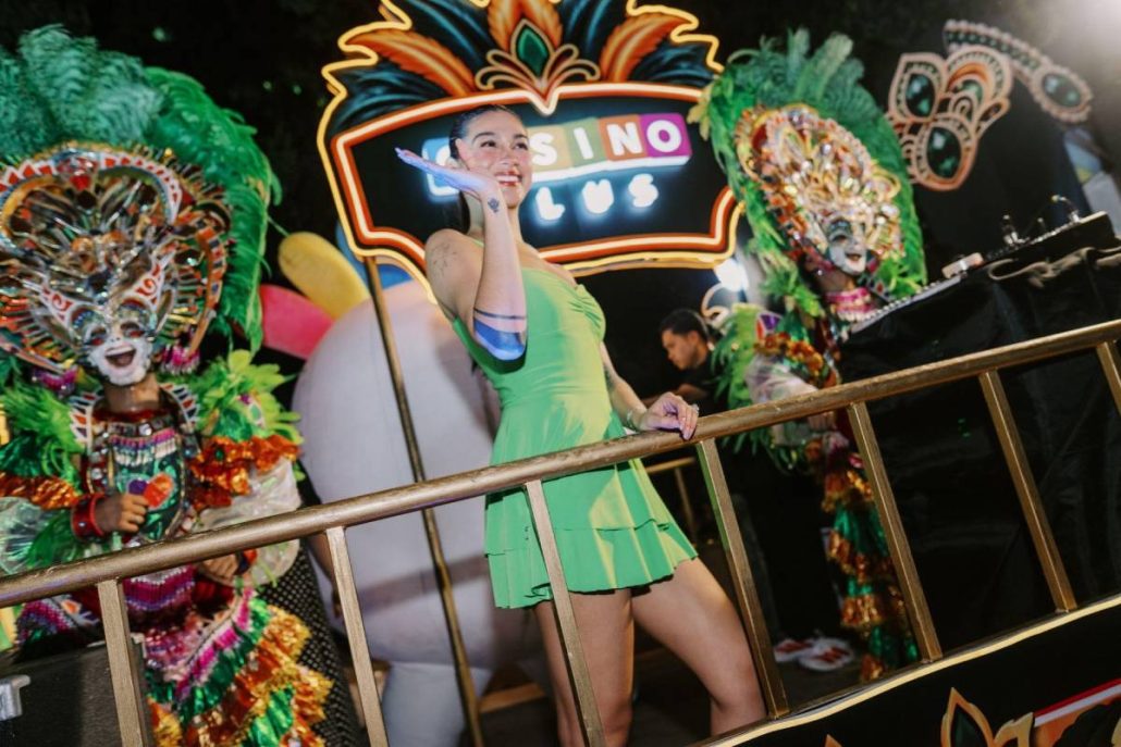 Social media star Zeinab Harake Parks greeted cheering spectators during the float parade.