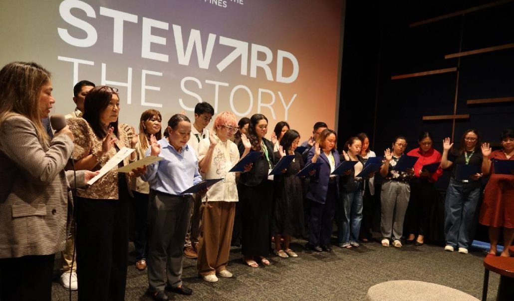 PRSP President Ana Pista, APR, leads the induction ceremony for new members from the Visayas during the regional launch at SM City Cebu.