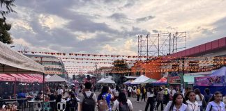 Festivalgoers gather around the Bacolod Public Plaza as the MassKara Festival 2026 gets underway, with authorities urging the public to remain vigilant and observe safety precautions throughout the celebration. MAE SINGUAY/PN