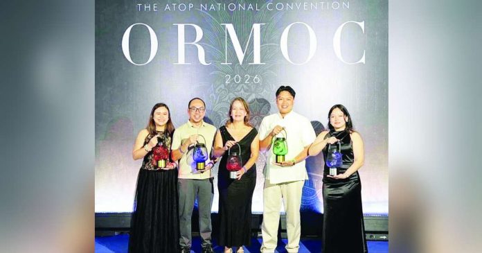 Secretary to the Mayor Atty. Jose Marty Go and Chief Tourism Operations Officer Ma. Teresa Manalili received the five national tourism awards on behalf of the Bacolod City Government during the 2026 ATOP Pearl Awards ceremony in Ormoc City on October 21. BCCO-PIO PHOTO