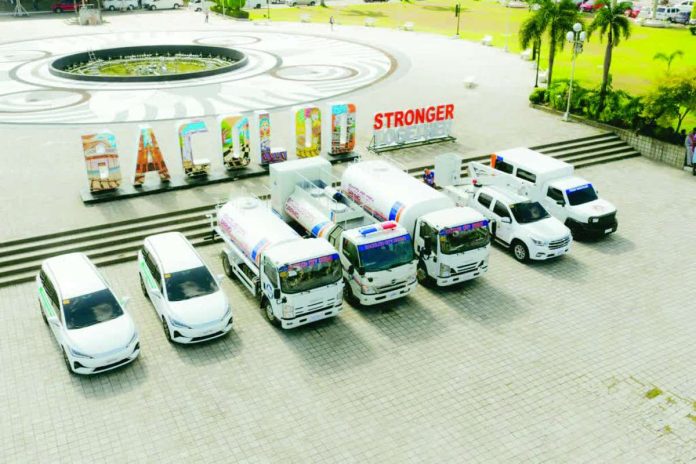 The seven newly acquired vehicles of the Bacolod City Government are lined up at the Bacolod City Government Center grounds following their blessing ceremony on October 26, 2026. The units will support emergency response, environmental management, public employment services and other city government operations. BCCO-PIO PHOTO