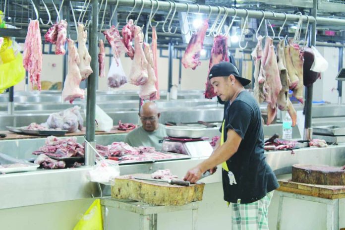 DA_pork_prices.JPG_resized Data from the Philippine Statistics Authority showed that an average retail price of P290.85 per kilogram at the national level was reported for fresh pork, meat with bones during the first half of October 2026. PN FILE PHOTO