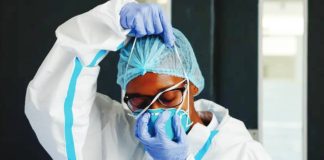 10 people linked to Kenya’s first Ebola case quarantined A nurse wears in white protective clothes and blue gloves at an Ebola isolation facility in Kenya. REUTERS