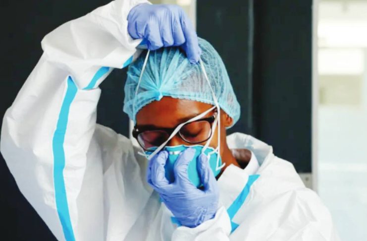 10 people linked to Kenya’s first Ebola case quarantined A nurse wears in white protective clothes and blue gloves at an Ebola isolation facility in Kenya. REUTERS