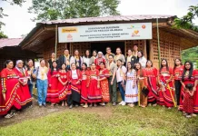 A new milestone for Maybank Women Eco Weavers in the Philippines. The official launch of the MWEW ANTHILL Abaca Weaving Training Centre in Bukidnon brought together the Daraghuyan Bukidnon Tribe, Maybank Foundation, ANTHILL Fabric Gallery and local partners to celebrate a shared commitment to preserving cultural heritage and strengthening community livelihoods. The launch of the MWEW ANTHILL Abaca Weaving Training Centre in Bukidnon marks the programme’s 13th training centre across five ASEAN countries and its second in the Philippines. To date, MWEW has supported 20 women weavers and 25 abaca farmers in the Daraghuyan community, alongside the planting of 6,250 abaca plants. By bringing fibre cultivation and weaving closer together, the centre strengthens the local value chain while creating a foundation for sustainable livelihoods and the preservation of Pinangabol weaving. Standing in the back row from left; Emma Lim-Sandrino, Board of Directors, ANTHILL Fabric Gallery (with glasses and in black shirt), Marven Jan Nadela, Senior Tourism Operations Officer, Malaybalay City Tourism Office (with glasses in black jacket); Atty. Anna Marie R. Bergado, City Administrator, Malaybalay City (in light pink jacket); Anya Joy Lim, Princess Ant/Co-Founder of ANTHILL Fabrics Gallery (in beige t-shirt); Noor Fadzlin Ariffin, Head, Community Empowerment, Maybank Foundation (in army green shirt); Bae Inatlawan Adelina Tarino, Tribal Leader, Daraghuyan Bukidnon Tribe (in tribal costume and white headscarf); Johann Nawawi, Architect Benefactor of MWEW Programme (with glasses in army green shirt); Edelyn Castro, Head, Corporate Affairs, Maybank Philippines (in army green shirt); Cecille Egnar, Provincial Environment and Natural Resource Officer, Bukidnon Environment & Natural Resources Office (in black jacket); Artificio Lacang, Jr., Visayas-Mindanao Region Head, Maybank Philippines (in army green shirt) and Rochelle Astreid Raymundo, Community Development Programme Consultant, ANTHILL Fabric Gallery (in white jacket). Standing in the front row with the weavers, third from the left: Maria Easterluna Canoy, Executive Director, Kintanglad Integrated NGOs (in purple shirt and black lace vest); Annie Lim, Queen Ant/Co-Founder, ANTHILL Fabric Gallery (in white shirt); Salome Tarino, Community Manager of Daraghuyan Bukidnon Balay Hu Paglala Ha Abaca (tenth from left in red tribal dress); Amirul Muhammad, Senior Manager, Community Empowerment, Maybank Foundation (in army green shirt and dark green pants); and Jonnalyn Mangga, Trainer/Weaver, Daraghuyan Bukidnon Tribe (in light pink shirt and denim pants).