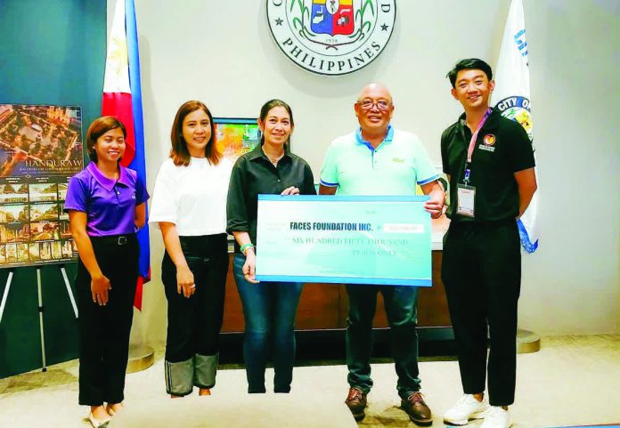 MassKara_80s_resized_resized_resized_compressed Bacolod City First Lady Maita Gasataya leads the turnover of the P700,000 donation to Faces Foundation Inc. on October 14, proceeds from the MassKara 80s Party and additional contributions from supporters to help cancer patients and their families in Bacolod City. BCCO-PIO PHOTO