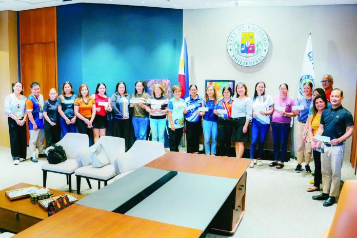 MassKara_subsidies_copy_compressed_resized The Bacolod City Government has released P13.6 million in financial assistance to 15 barangays and 11 schools participating in the 47th MassKara Festival to help cover their preparation and production expenses. The subsidies support contingents competing in the street dance and arena and Electric MassKara competitions scheduled from October 16 to 18. BCCO-PIO PHOTO