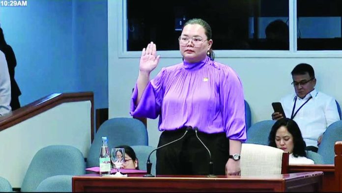 Metrobank Anti-Money Laundering Division Head Atty. Niña Aguilar takes her oath as witness in the impeachment trial of Vice President Sara Duterte-Carpio. “For suspicious transaction reporting based on negative media, we generally file a suspicious transaction report if we have identified our customer as the subject of negative media and conduct further review on the transactions,” Aguilar says.