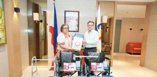 PCSO turns over medical devices to NCSC-NCR Philippine Charity Sweepstakes Office's (PCSO) General Manager Melquiades A. Robles (right) turns over medical devices and charitimba food packs to National Commission of Senior Citizens-National Capital Region's Commissioner Gloria Mercado.