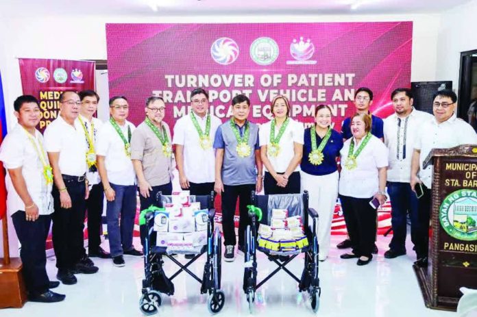PCSO1_compressed_resized Philippine Charity Sweepstakes Office’s General Manager Melquiades A. Robles (fifth from left) leads the turnover of medical equipment and medicines to the Municipality of Santa Barbara in Pangasinan.