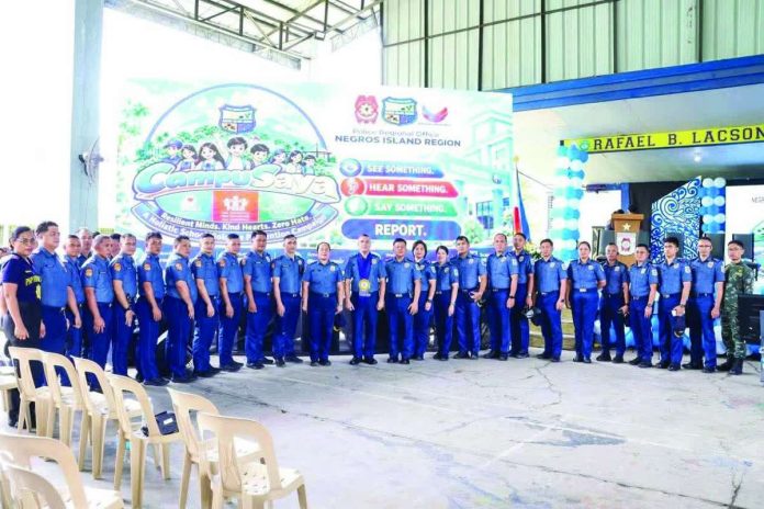 PRO-NIR_campusaya_compressed_resized PRO-NIR personnel take part in the launch of the CAMPUSAYA initiative at Rafael B. Lacson Memorial High School in Talisay City, Negros Occidental, on October 23, 2026. The campaign seeks to prevent school violence, combat bullying and online threats, and promote safer and more supportive learning environments through stronger cooperation among police, schools, parents, and communities. CESAR JOLITO III PHOTO