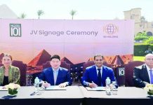 Hotel101 founder Injap Sia (second from left) and Mr. Khaled Sheta of IGI Holdings lead the signing ceremony with the world famous Egypt pyramids at the background.